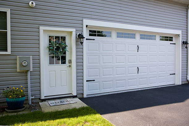 24/7 Emergency Garage Door Panel Replacement experts in Muenster, TX
